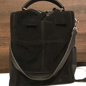Brand new black suede/faux leather bag.
